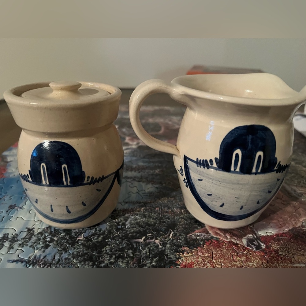 Pottery pitcher and one with lid